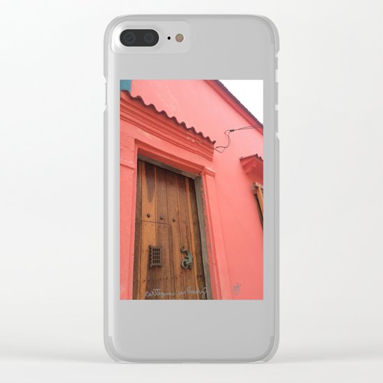 Cartagena is Peachy, Colombia, South America. Coral Pink Building with Ornate Lizard design Clear iPhone Case