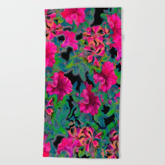vivid pink petunia on black background Beach Towel