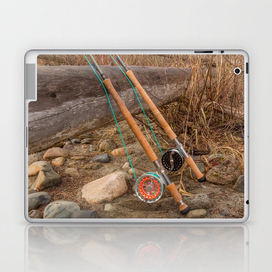 Two salmon spey fly rods resting on a log in the late afternoon sun, in British Columbia, Canada Laptop & iPad Skin
