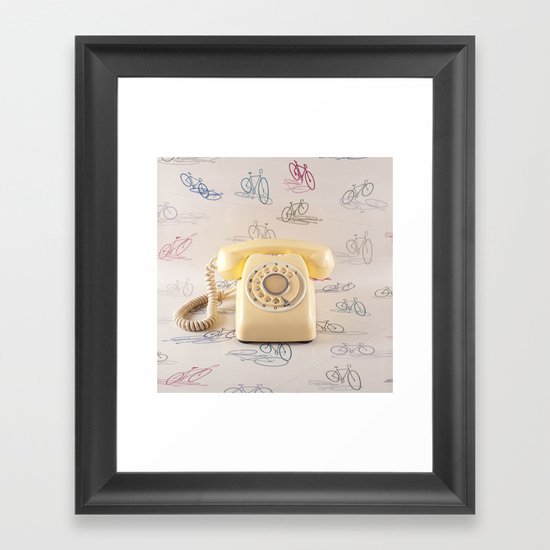 The yellow retro telephone Framed Art Print