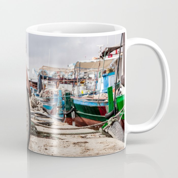 Moped in harbor Coffee Mug