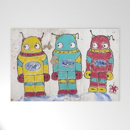 Cute retro martians - colorful streetart, in Lisbon, Portugal - spacemen travel photography Welcome Mat