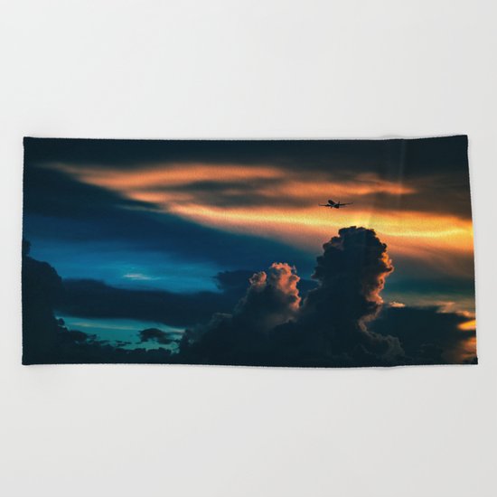 above the clouds Beach Towel