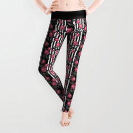 Red roses on black and white striped background. Leggings