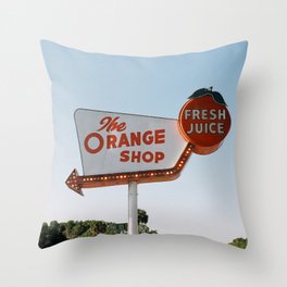 The Orange Shop Throw Pillow