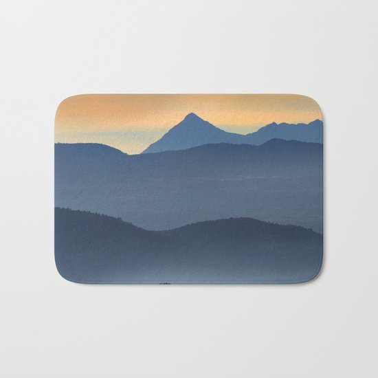"Misty mountains". Sunset at the mountains Bath Mat