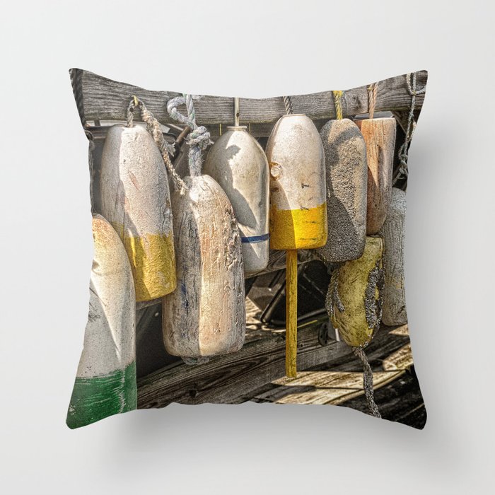 Old buoys at the dock Throw Pillow