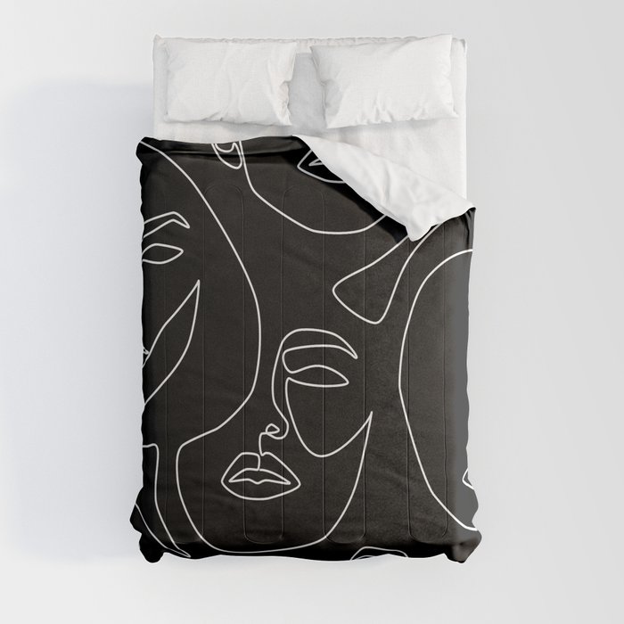 Faces in Dark Comforter