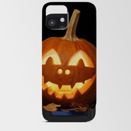 Carved Pumpkin for Halloween and Autumn Leaves on Black Background iPhone Card Case