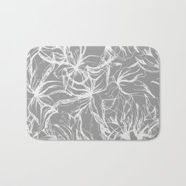White contour flowers on a gray background. Bath Mat