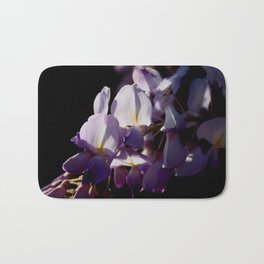 Wisteria Vine Flower Blurred Background With Black Bath Mat