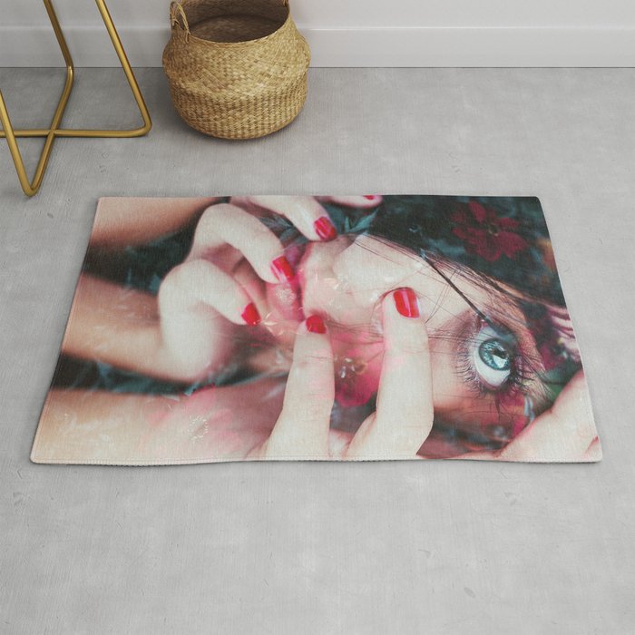 Face surrounded by flowers Rug