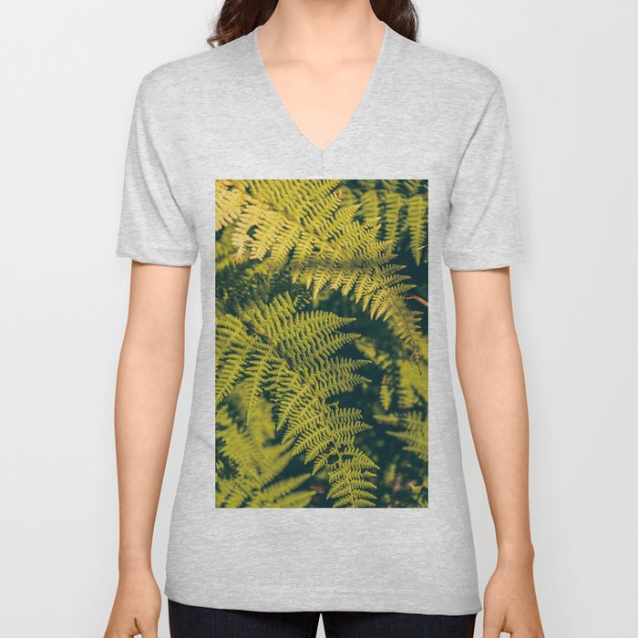 A green fern plants background with shadows.  V Neck T Shirt