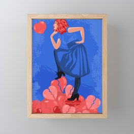 A courageous woman stands on a bunch of broken hearts and looks with interest at an unbroken heart Framed Mini Art Print