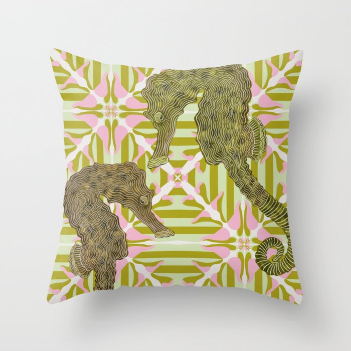 Seahorses swimming on a green and pink patterned background Throw Pillow