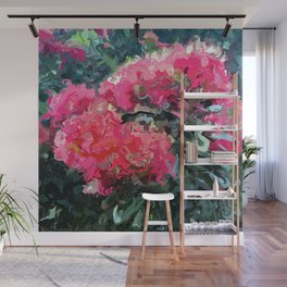 Red flower blossoms amid lush green foliage Wall Mural