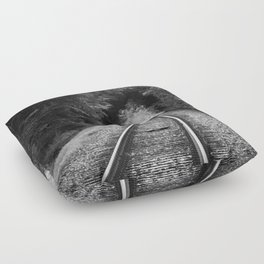 Don't go riding on the long black train; lonely railroad tracks through natural tunnel of leafy trees black and white photograph - photography - photographs Floor Pillow