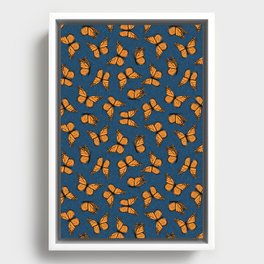 monarch butterflies - orange on dark blue Framed Canvas