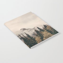 Banff national park foggy mountains and forest in Canada Notebook
