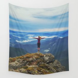 Young woman  on a stone   with raised hands,Carpathian ,Ukraine Wall Tapestry