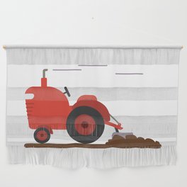 A vintage tractor plowing the land Wall Hanging
