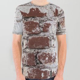 Old painted brick wall with peeling white paint All Over Graphic Tee