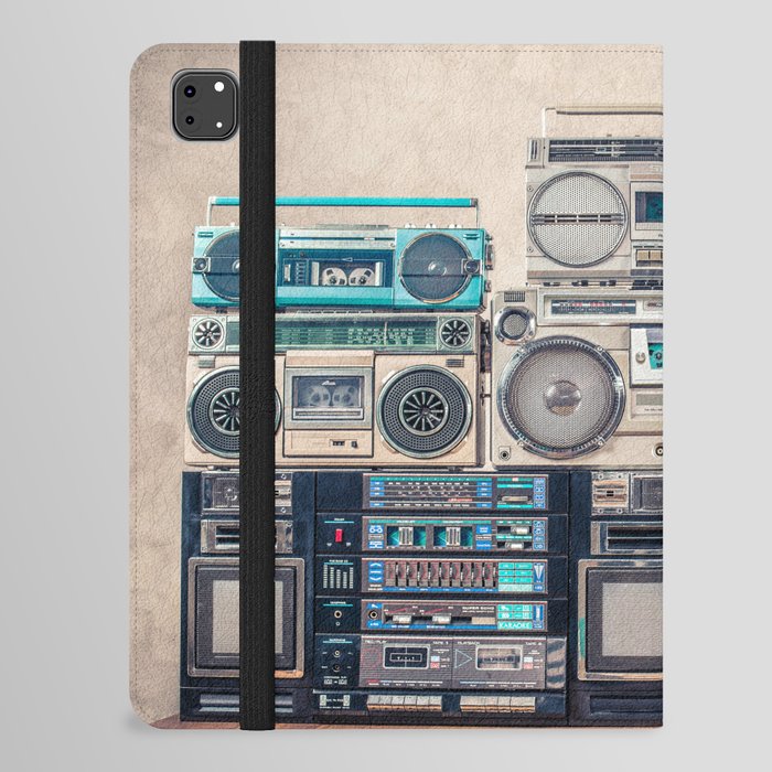 Retro old school design ghetto blaster stereo radio cassette tape recorders boombox tower from circa 1980s front concrete wall background. Vintage style filtered photo iPad Folio Case