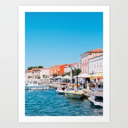 Harbour with blue sea and orange houses Art Print