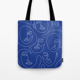 Faces In Blue Tote Bag