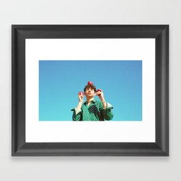 Boy with fruit Framed Art Print