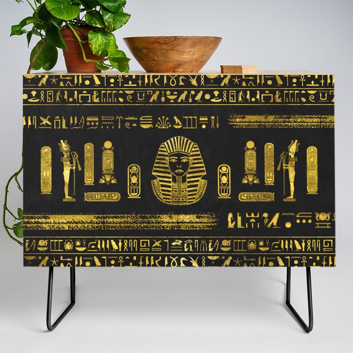 Golden Egyptian Sphinx on black leather Credenza