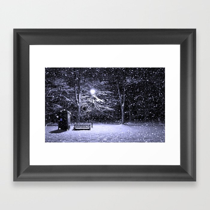 Tardis in the snow. Framed Art Print