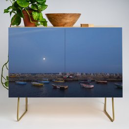 Sunrise at the sea shore - with small fishing boats Credenza