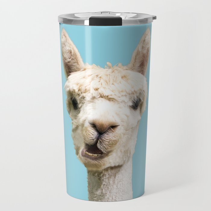 Cute white alpaca portrait on blue sky background Travel Mug