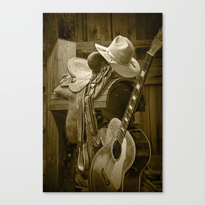 Western Country 6 String Acoustic Guitar in Sepia Tone with Horse Saddle and Cowboy Hat Canvas Print