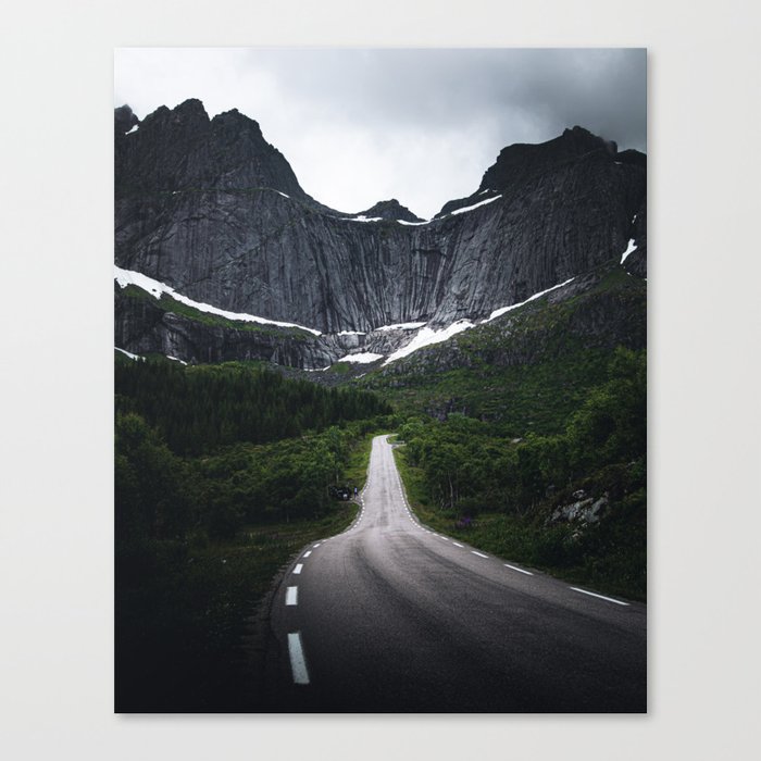 A road into the mountains Canvas Print