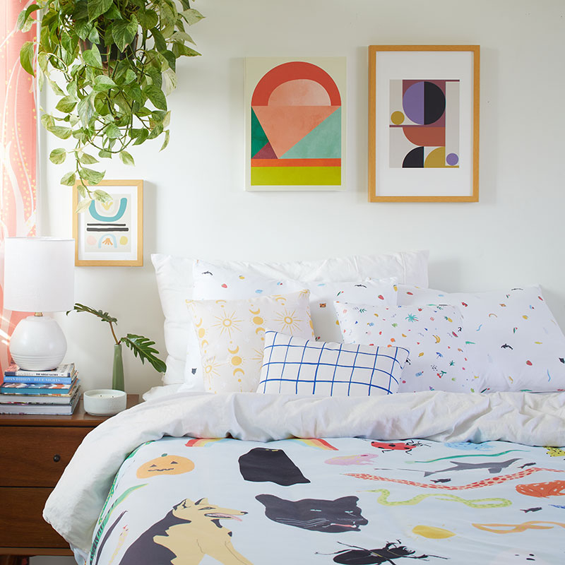 bed with animal patterned duvet cover