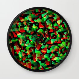 Flowing bright on orange from spots and splashes of green paints. Wall Clock