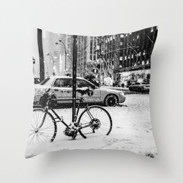 New York City Manhattan street with yellow taxi cab during winter snowstorm black and white Throw Pillow