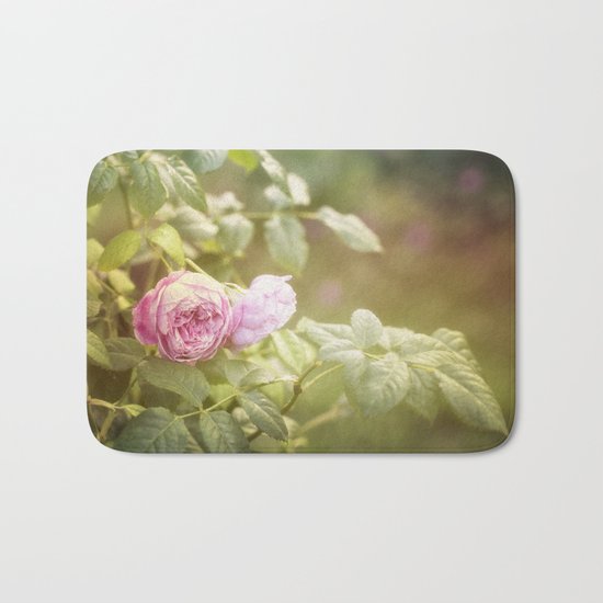Rose in late sunlight Bath Mat