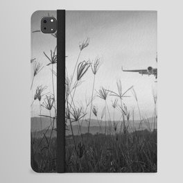 To places unknown ... perfect airplane takeoff from tropical mountain coastal setting black and white photograph - photography - photographs iPad Folio Case
