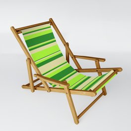 [ Thumbnail: Light Green, Forest Green, and Pale Goldenrod Colored Lines Pattern Sling Chair ]
