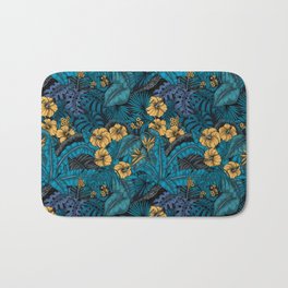 Tropical garden in blue and yellow Bath Mat