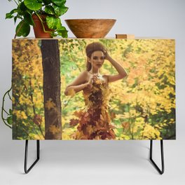 Autumn leaves; female wearing gown dress of leaves magical realism fantasy color portrait photograph / photograph  Credenza