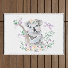 Baby koala with blue eyes and flowers Outdoor Rug