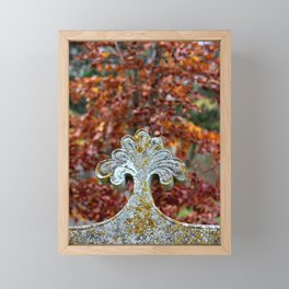 Grave against autumn leaves Framed Mini Art Print