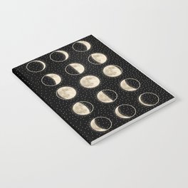 shiny moon phases on black / with stars Notebook