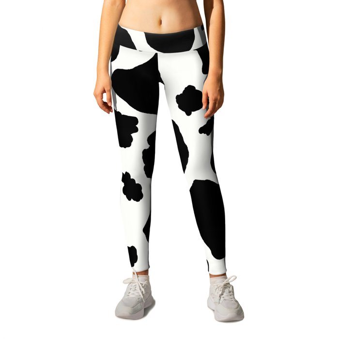black and white animal print cow spots Leggings by Amy Gale