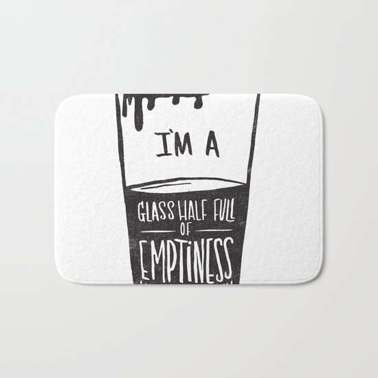 glass half full of emptiness Bath Mat