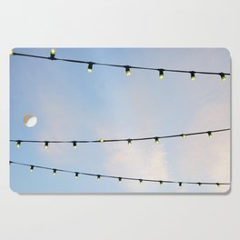 Light bulbs in the sky | Festive decoration in the street | Simple beauty Cutting Board